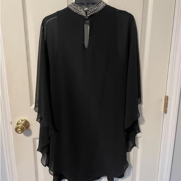 XSCAPE - Picture 2 of 3